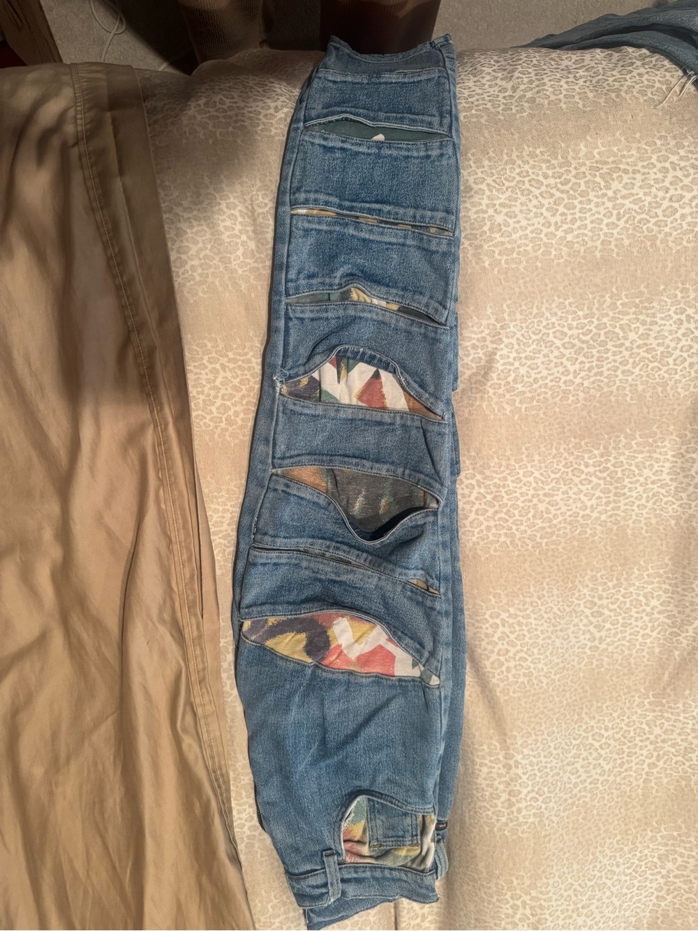 Blue Distressed Women's Jeans with Multi-Color Patch Details